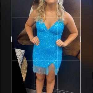 Sophia Thomas blue homecoming dress.